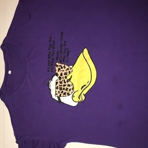 XL but fits lie a medium has two little stains cute for making a crop T-shirt